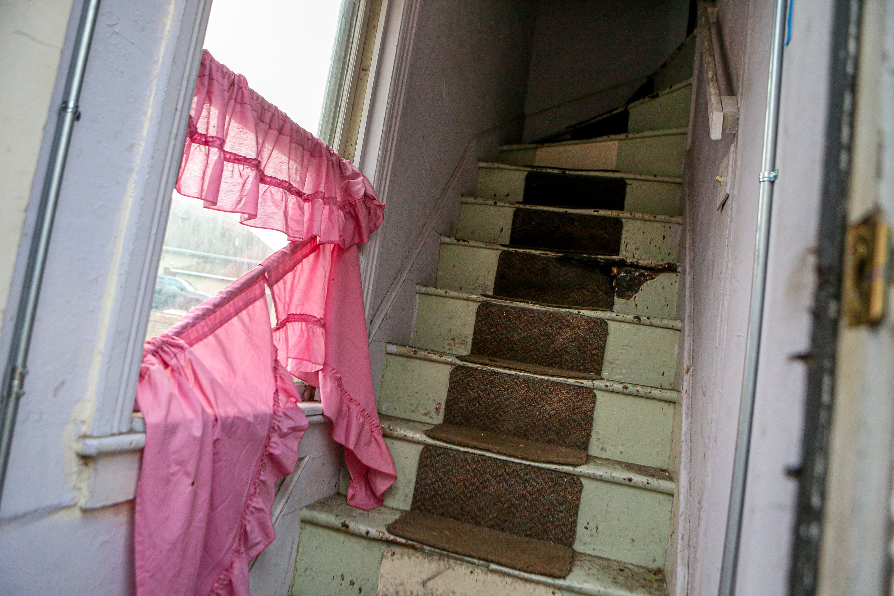 The stairway where Black left a trail of blood while heading to his room after injuring his leg.