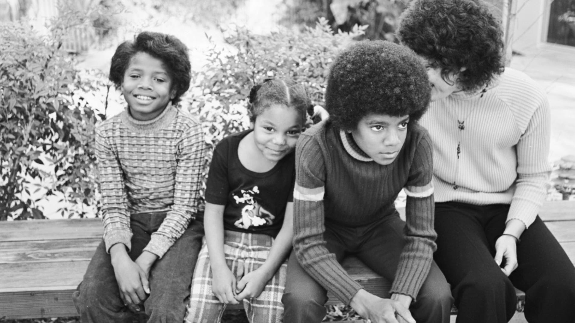 The Jackson siblings including Janet (second from left) sharing a family moment. The documentary 