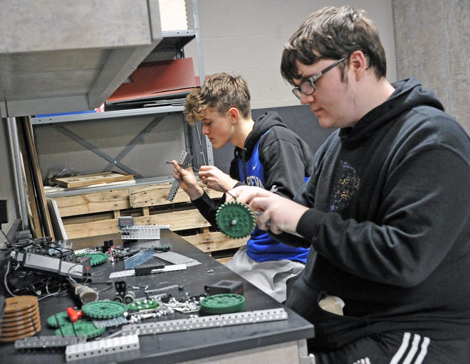 Chippewa students Stephen Laveli and Aidan Raber work on a new robotics kit recently purchased.