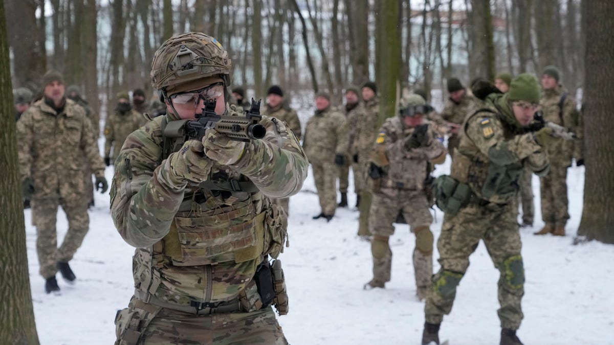 Members of Ukraine's volunteer military units  train in a city park in Kyiv on Jan. 22, 2022.