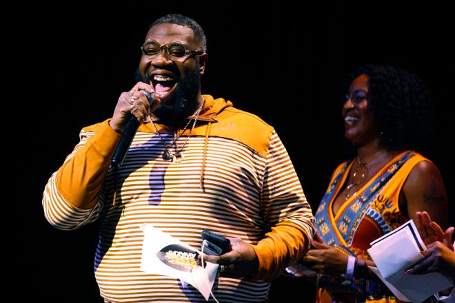 Patrick Watkins accepts his award for Barber of the Year at the seventh-annual Athens Hip Hop Awards at The Foundry in Athens, Ga., on Sunday, March 24, 2019. [Photo/ Jenn Finch, Athens Banner-Herald]