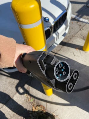 Electric vehicle customers in New Bern will need to make sure their car is compatible with the charging stations at the Red Bear Parking Lot prior to using the stations.