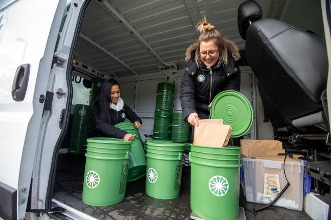 Owner Lauren Rustimosa and operations manager Allison Conrad at a brick base providing waste recycling management as they prepare to deliver and collect recycling buckets from clients in Asbury Park, New Jersey, Thursday, January 27. We're talking about Un-Waste, our business.  2022. 