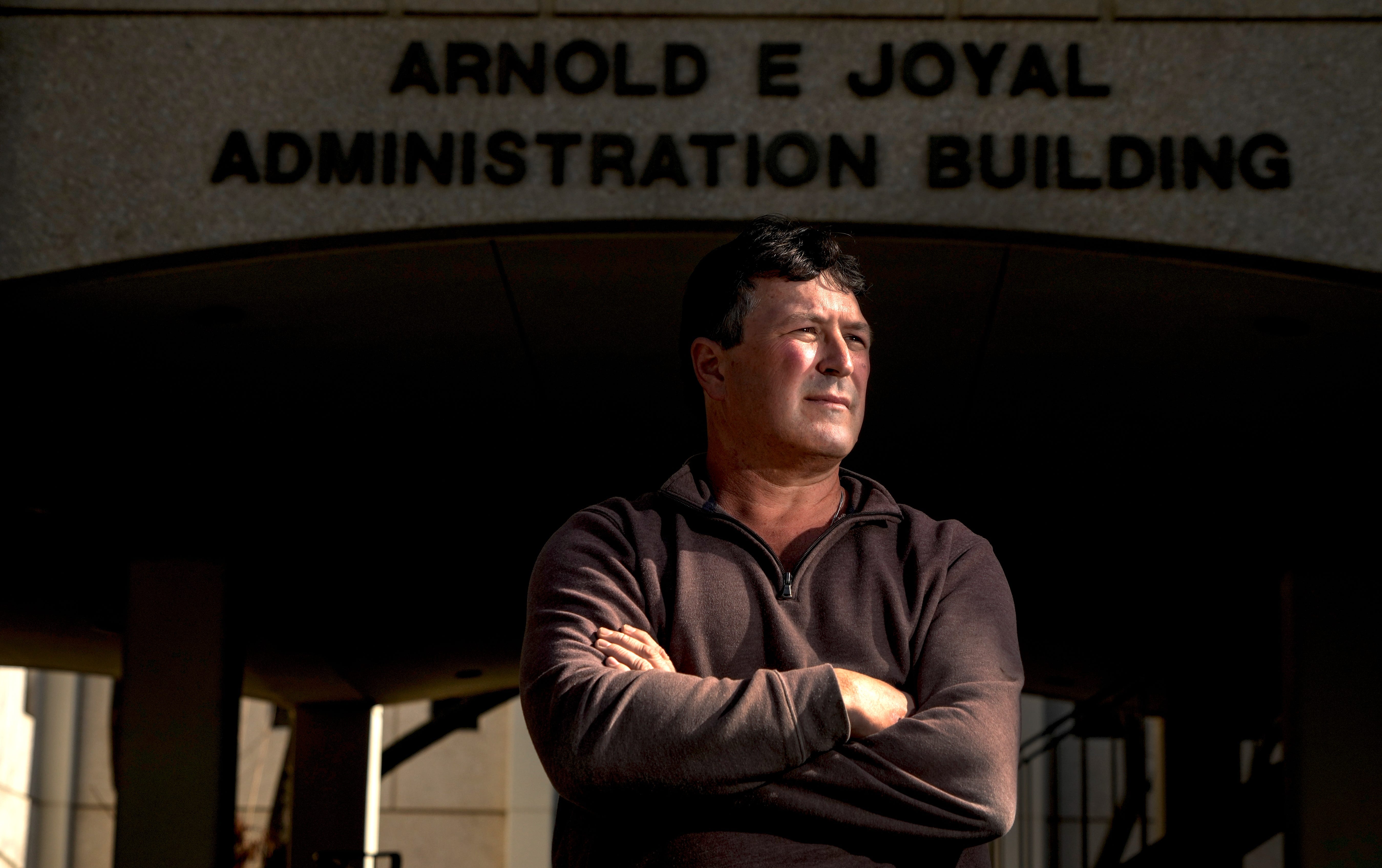 Terry Wilson in front of the Joyal Administration Building on the campus of California State University, Fresno, where he used to work. Wilson is a former analyst in Fresno State's student affairs division who said Frank Lamas retaliated against him after he complained about Lamas' behavior to human resources.