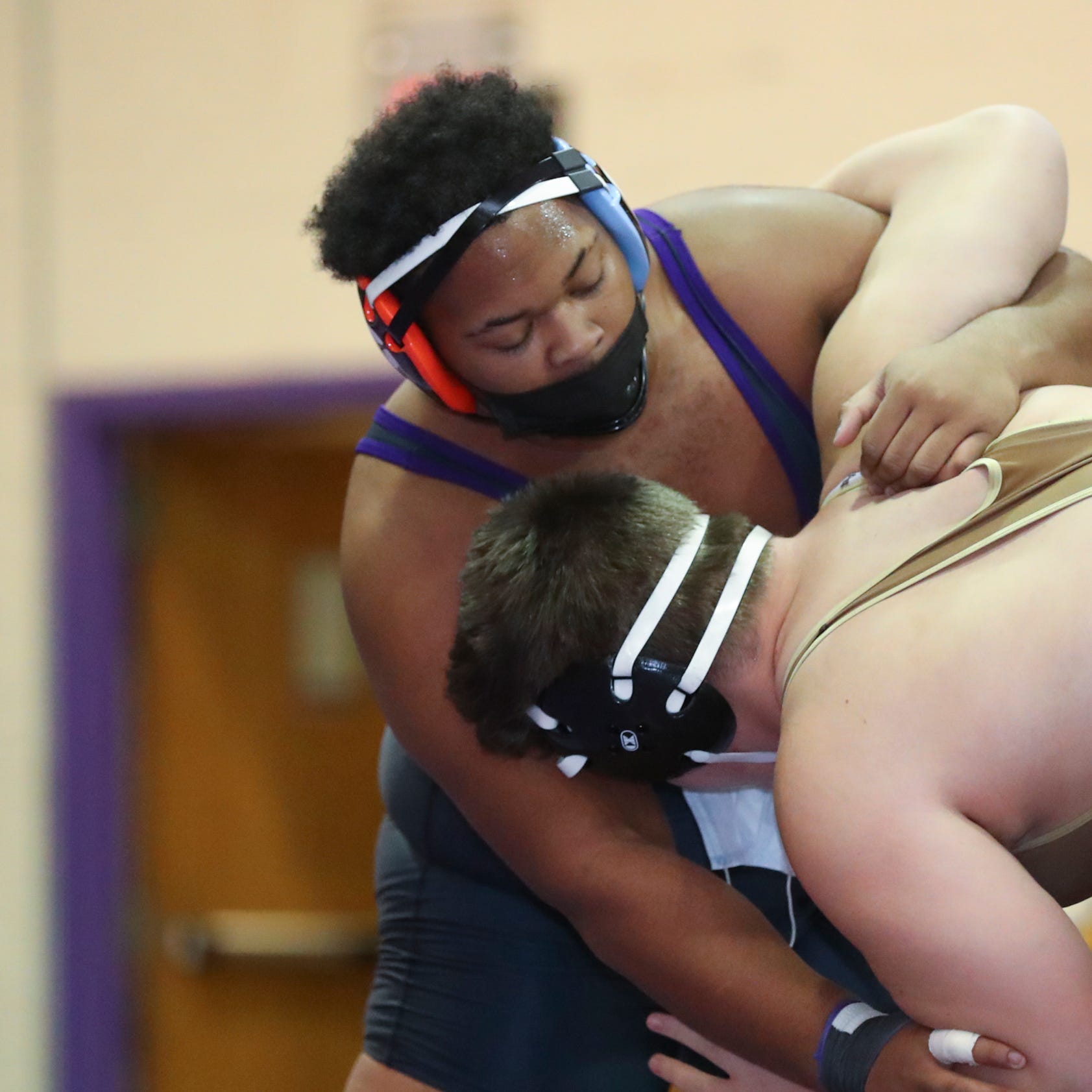 Clarkstown North's Justin Smoot defeats Clarkstown South's Alfred Smith in a 285-pound match during a dual meet at Clarkstown North High School in New City on Thursday, January 27, 2022. Clarkstown South won the meet 41-30.