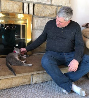 Willow, the new pet cat of President Joe Biden, came from the farm of Lawrence County, Pennsylvania farmer Rick Telesz, shown in this undated photo with Willow. Telesz is a Democratic candidate running against incumbent U.S. Rep. Mike Kelly, of Butler, R-16th Dist.