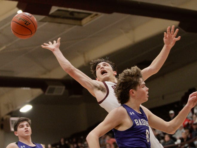 Brownwood's Jakob Hataway attempts a contested layup against Lampasas on Friday.