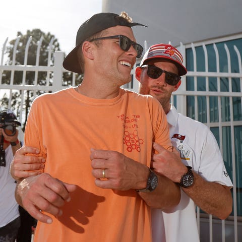 Tampa Bay Buccaneers quarterback Tom Brady (left) 