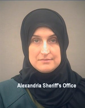 This undated photo provided by the Alexandria, Virginia, Sheriff's Office in January 2022 shows Allison Fluke-Ekren. Fluke-Ekren, 42, who once lived in Kansas, has been arrested after federal prosecutors charged her with joining the Islamic State group and leading an all-female battalion of AK-47 wielding militants. The U.S. Attorney in Alexandria announced Saturday that she has been charged with providing material support to a terrorist organization.