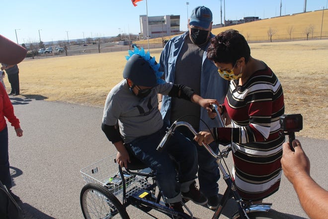 Anakin Rojas tries out his new adaptive cycle Jan. 22, 2022 at the Pat and Lou Sisbarro Field, provided through the "Everybody Rides With Grace" program.
