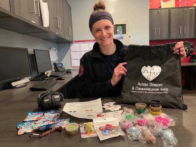 Firefighter/Paramedic Kayla Geffert shows the contents of the Farmington Hills Fire Department’s new Autism Sensory and Communication Bags.
