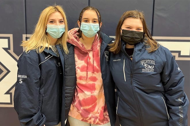 Exeter High School girls hockey team captains, from left, Bella Donohue, Emma Sughrue, and Caitlyn Knowles are organizing this year's annual Stick to Stigma game.