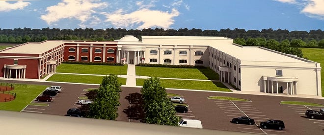 This rending shows Pinnacle Classical Academy after its second wing is built. The new wing will be built in brick to match the existing school structures.