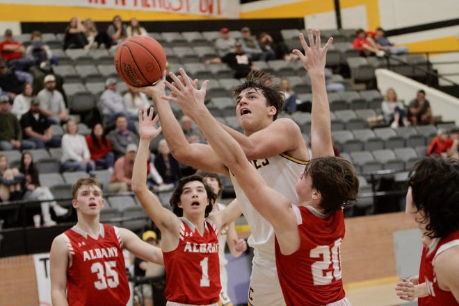 Cisco's Dawson Hearne shoots a floater against Albany on Tuesday, Feb. 1, 2022.