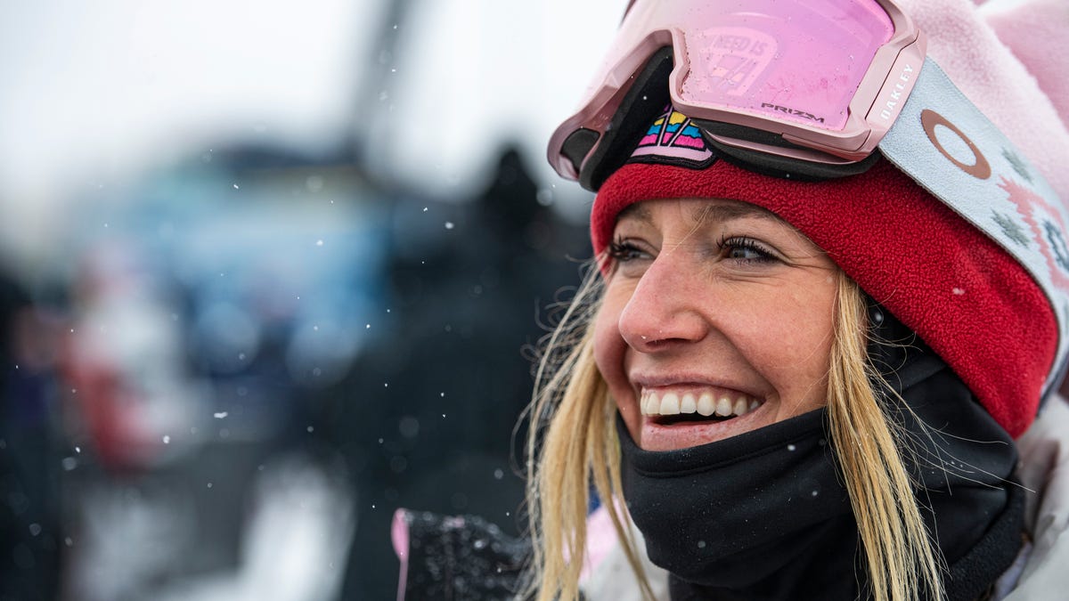 Jamie Anderson stands at the base of the slopestyle course at Aspen on Friday, Jan. 21, 2022.