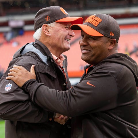 Cleveland Browns owner Jimmy Haslam, left, talks h