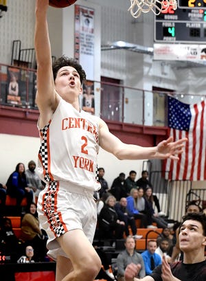 Central York's Ethan Dodson breaks away for a score against J. P. McCaskey during action at Central Wednesday, Feb. 2, 2022. Bill Kalina photo