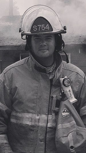 Austin Smith, firefighter with St. Paul Fire District