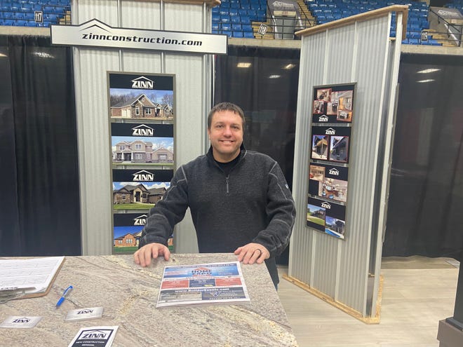 Phil Zinn, owner of Zinn Construction LLC in Springfield, stands at his company's booth Saturday at the Home Expo at the Bank of Springfield Center.