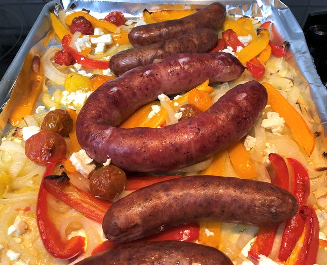 Sausage Supper with onions, bell peppers, cherry tomatoes and feta