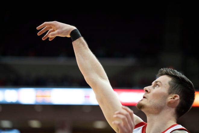 Ohio State Buckeyes forward Kyle Young (25) follows his shot during the NCAA mens basketball game between the Ohio State Buckeyes and the Maryland Terrapins at the Scottenstein Center in Columbus, Ohio, on Sunday, Feb. 6, 2022.  
