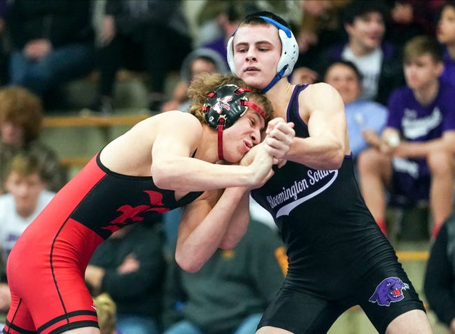 Edgewood’s Cash Turner and Bloomington South’s Evan Roudebush wrestle in the championship match for the 138 lb. weight class during the IHSAA boys’ wrestling regionals at South Saturday.