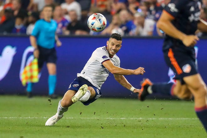 Former D.C. United midfielder Felipe Martins crosses a ball during a match against FC Cincinnati last season. On Monday, Austin FC announced the signing of the 10-year MLS veteran to a one-year contract.