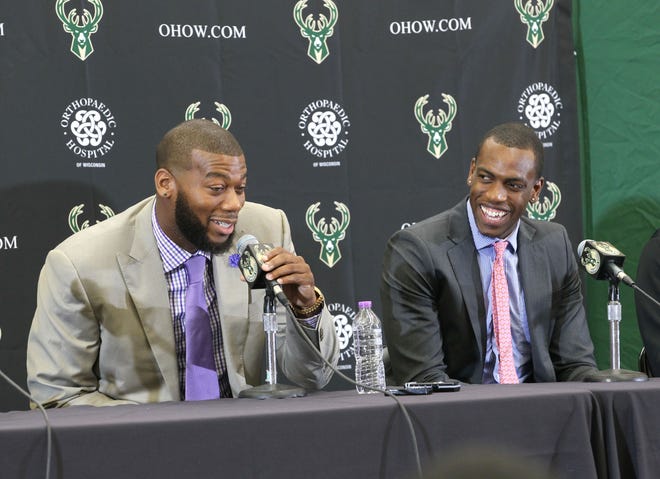 Greg Monroe (left) and Khris Middleton chat with the media at a press conference at the Cousins Center after signing contracts with the Bucks prior to the 2015-16 season.