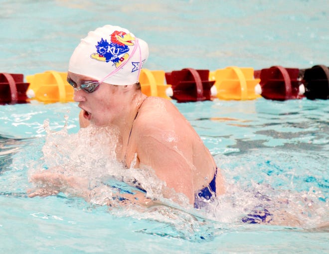 Bartlesville High graduate Kate Steward surges through the water in competition for the University of Kansas women's swimming team. Steward captured four championships in the meet. (Photo courtesy of Susan Steward)