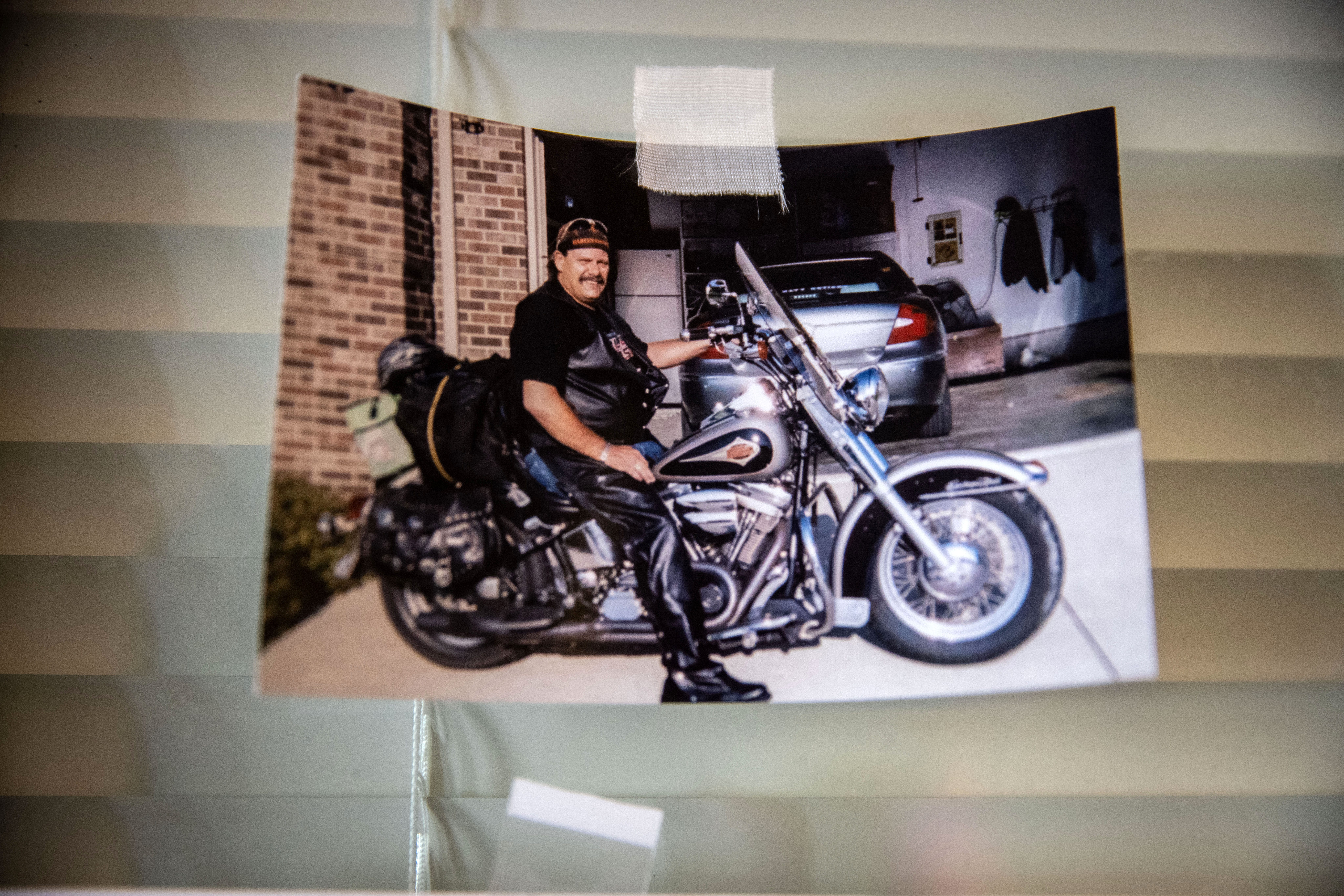 A photo of Rodney Eurom on his Harley hangs near his bed at Mary Greeley Medical Center in Ames.