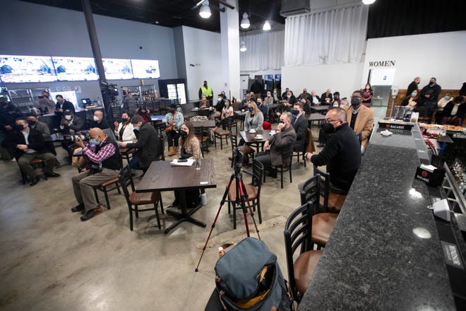 People gather during the the grand opening at AN OX Cafe on West Hampton Avenue in Milwaukee on Feb. 2.