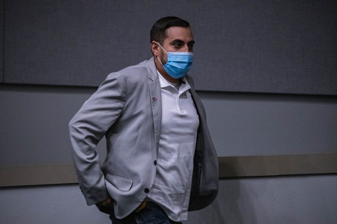 Jason Estrada attends a Las Cruces City Council hearing to determine the fate of Speak Easy's business license at City Hall on Tuesday, Feb. 8, 2022.