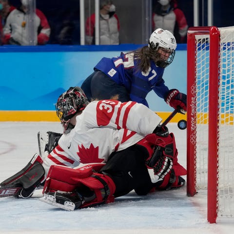 United States forward Abbey Murphy hits the post b