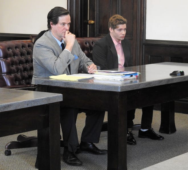 Attorney Patrick Williams with client Isaac Beichler Wednesday in Coshocton County Common Pleas Court. Beichler received 12 months in prison for a shooting incident on May 26.