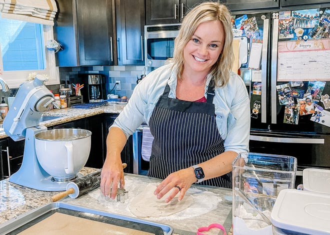 Lauren Corum, owner of So Baked custom cookies, in her Fountain City kitchen. Feb. 9, 2022.