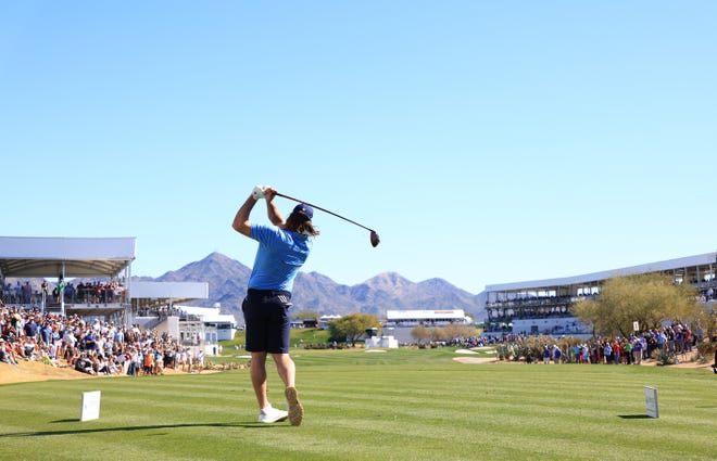 Aaron Rodgers of the Green Bay Packers plays his shot from the 17th tee during the pro-am prior to the WM Phoenix Open at TPC Scottsdale on Wednesday in Scottsdale, Arizona.