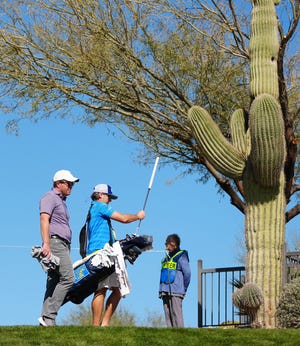 Feb 8, 2022; Scottsdale, Arizona, USA; Golfers make their way on the course during a practice round at the Waste Management Phoenix Open on Tuesday. Mandatory Credit: Patrick Breen-The Republic