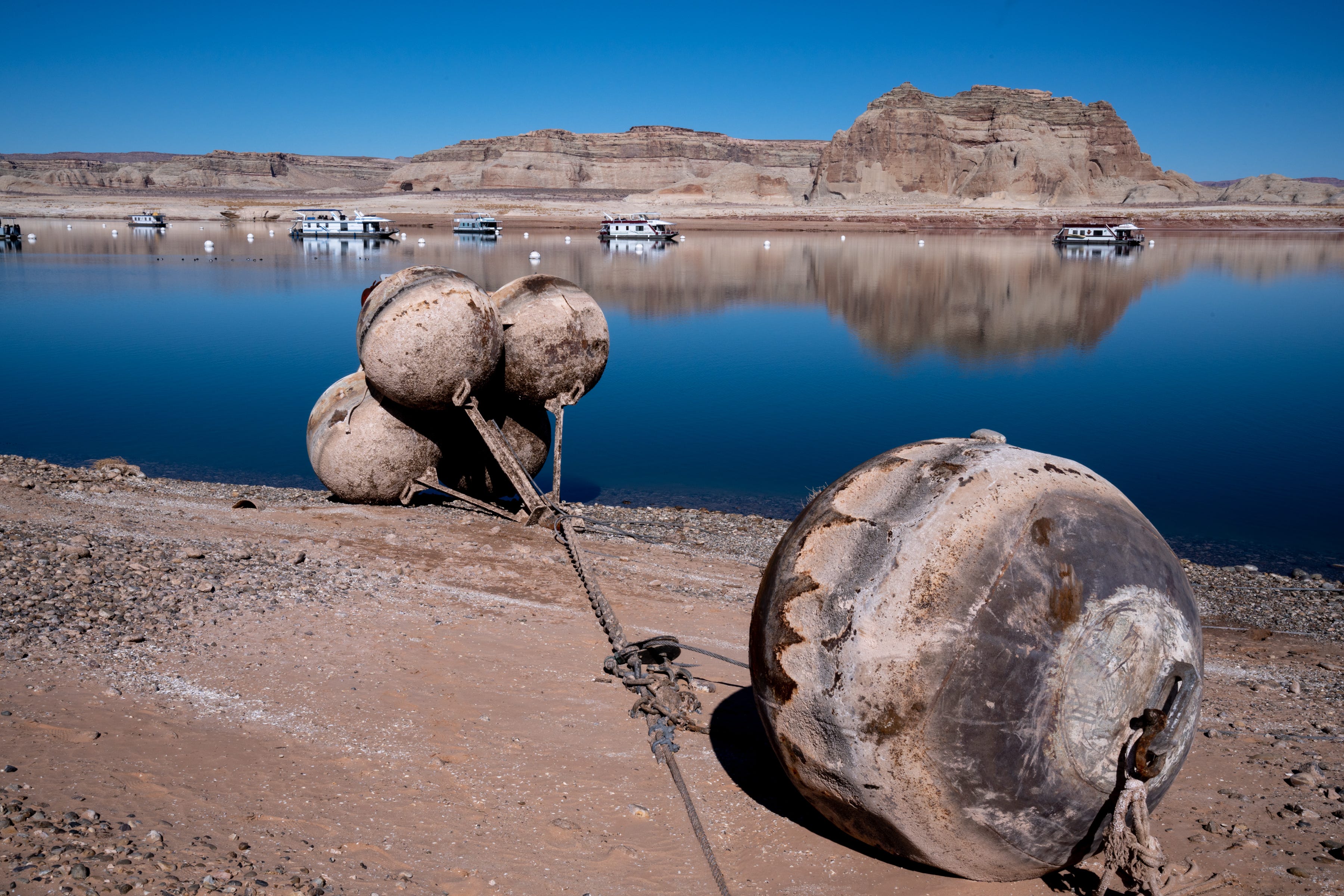 Grounded buoys sit on the shore at Wahweap Bay on Feb. 3, 2022, near Page.