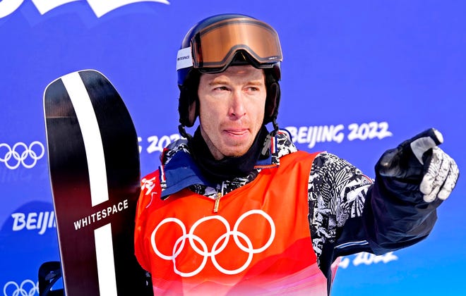 Shaun White reacts after a halfpipe qualification run.