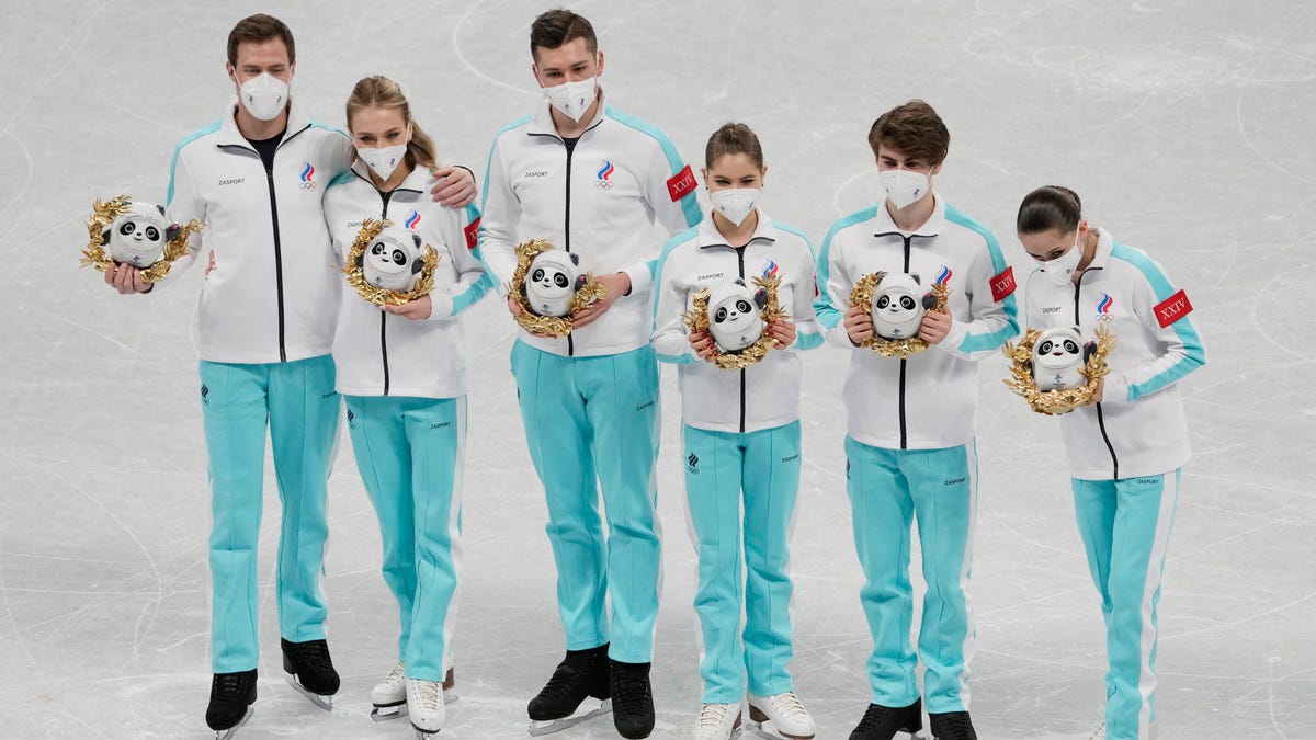 Olympic gold medalists from Russia celebrate after the figure skating mixed team competition during the Beijing Olympics.