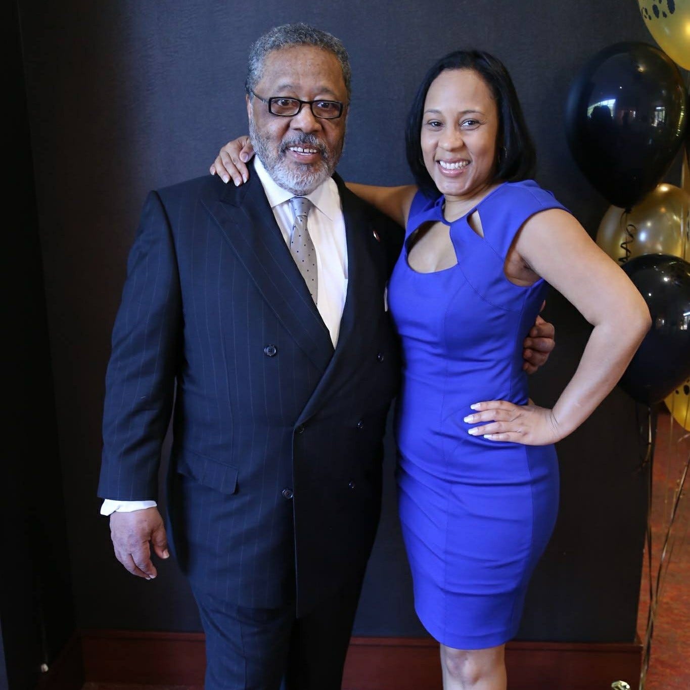 Fulton County District Attorney Fani Willis, right, with her father, John C. Floyd III, a longtime Washington, D.C., defense lawyer and civil rights activist.