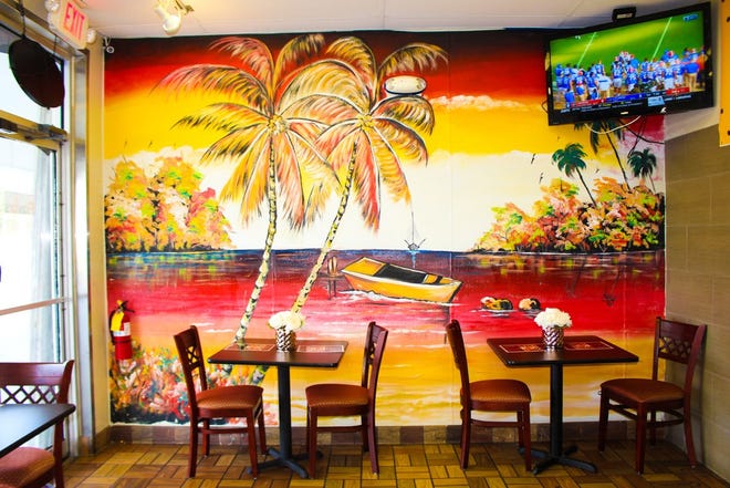 A peek inside Flavors Island Restaurant in West Palm Beach.