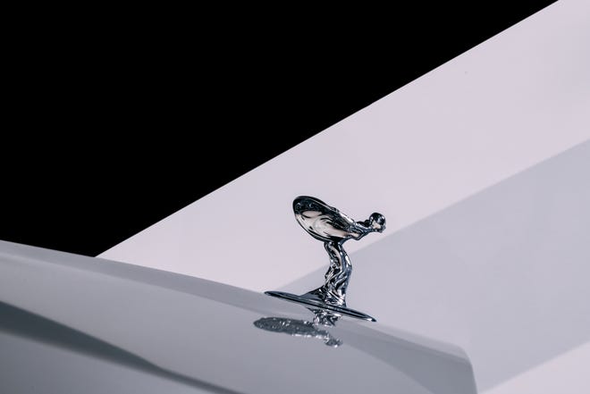 Rolls-Royce's classic "Spirit of Ecstasy" hood ornament has been updated for the luxury brand's transition to electric power.