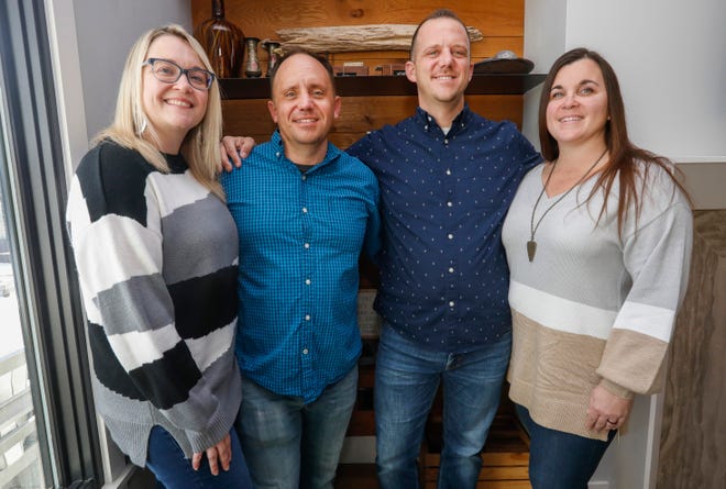 From left, Leigh, Jason, Matt, and Steph Bekebrede pose for a photo on Saturday, Feb. 5, 2022. Jason asked his brother Matt to accompany him on a date with Leigh, who in turn brought her sister Steph. In the end each brother married a sister.