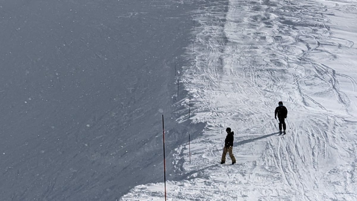 From the top of Peak 8 at almost 13,000 feet elevation, you descend through snowy bowls.