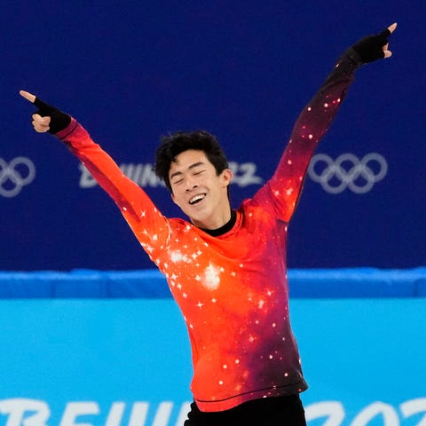 Nathan Chen completes his routine en route to the 
