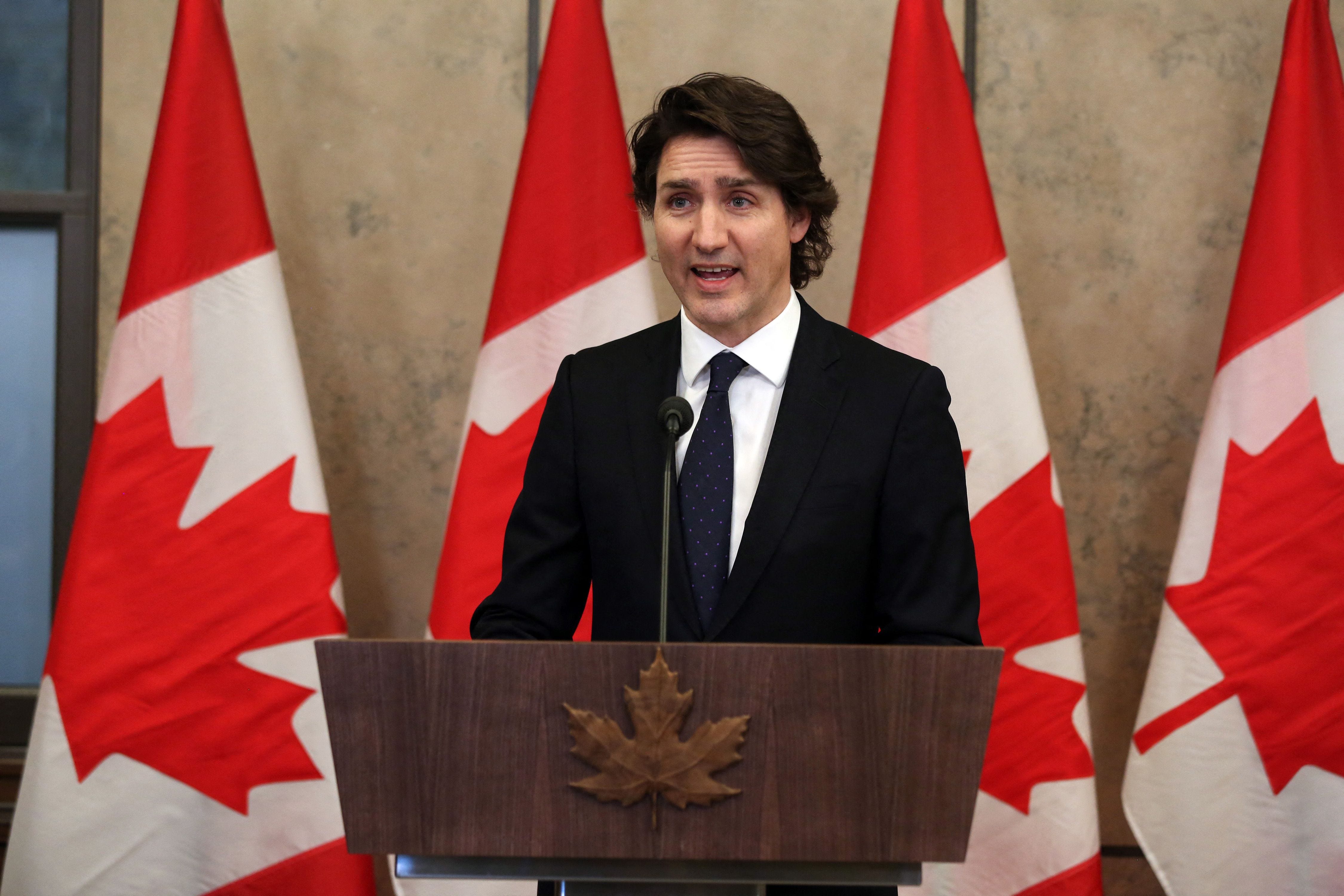 Canada's Prime Minister Justin Trudeau speaks with reporters during a news conference on Parliament Hill on Feb. 11, 2022, in Ottawa, Canada. Canadian leader Justin Trudeau faced mounting pressure from Washington Friday to bring an end to snowballing trucker-led blockades over Covid rules, as the protest epicenter of Ontario province declared a state of emergency.