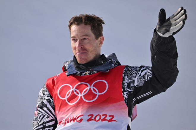 Shaun White acknowledges the crowd after his run in the men's halfpipe final at Genting Snow Park.