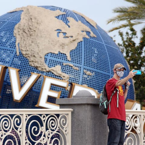 A visitor snaps a selfie at Universal Studios on t