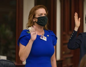 Rep. Kristen Arrington, seen being sworn in on the House floor in this undated photo.
